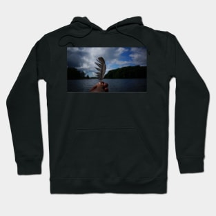 Holding Up a Feather at the Lake Hoodie